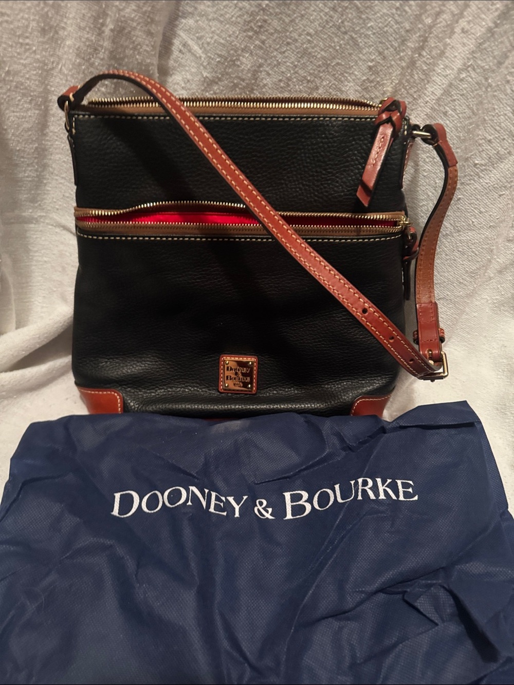 Dooney & Bourke Black Pebbled Leather Crossbody with Brown Trim and Red Accent